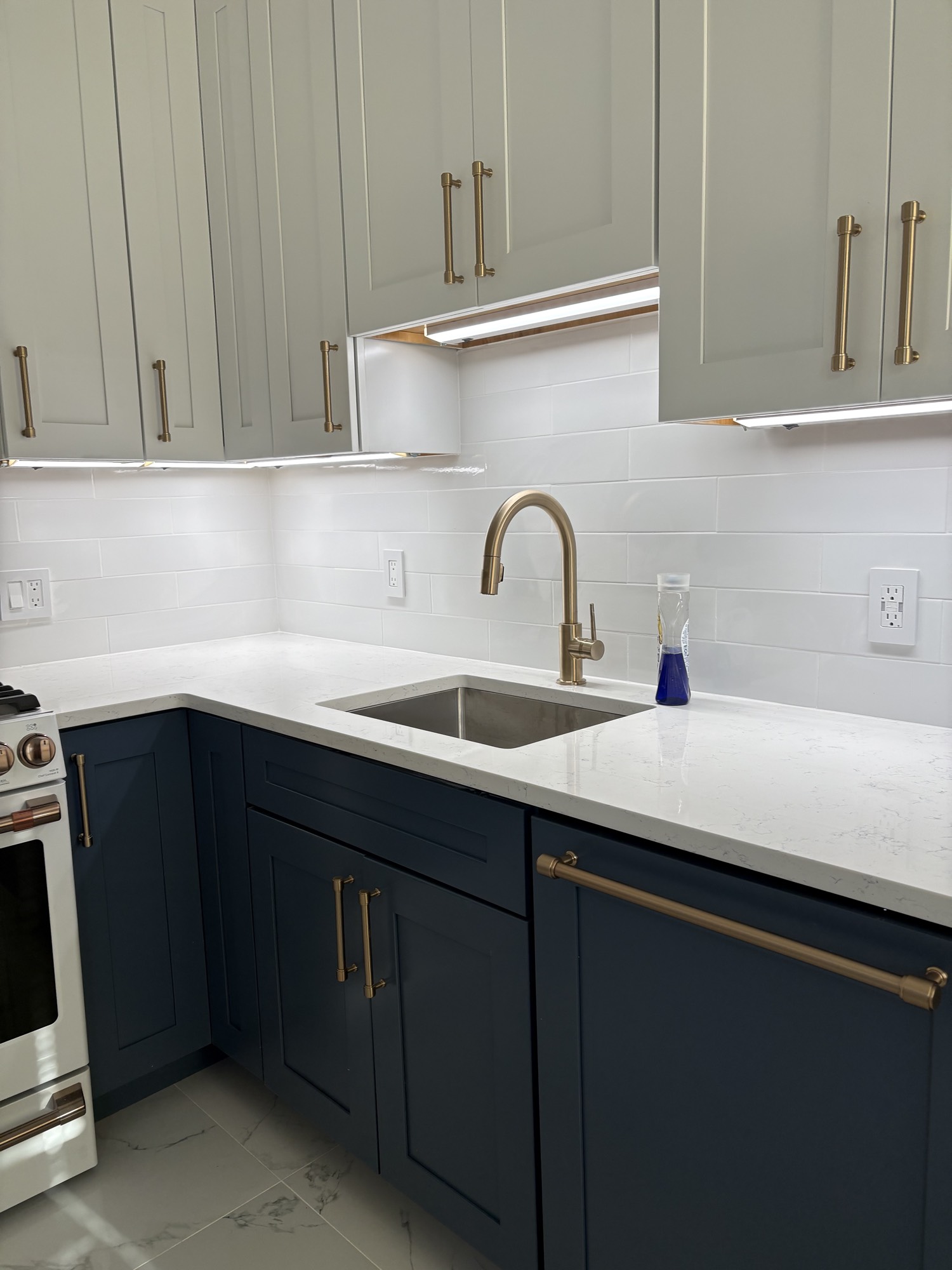 Kitchen sink and brass faucet detail